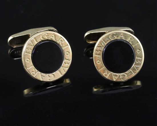A pair of modern Bulgari 18k, 585(14k) and black onyx set circular cufflinks,